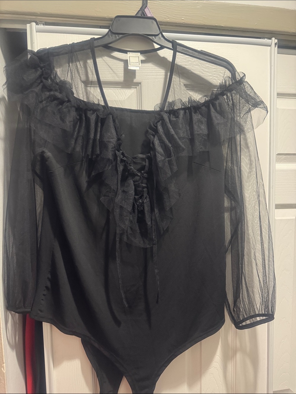 Black Sheer Ruffle Off-Shoulder Bodysuit with Lace-Up Detail